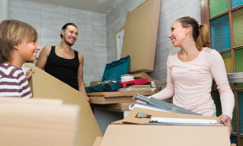 Same day removals team loading furniture in Bow
