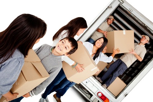 Team preparing a careful removals service in Bow
