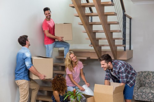 Removals team preparing items safely during a house move in Bow