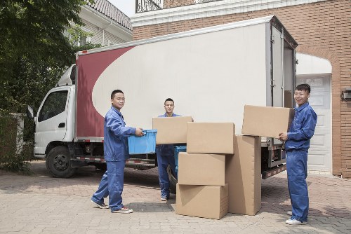 Packed boxes and household items prepared for a man and van move