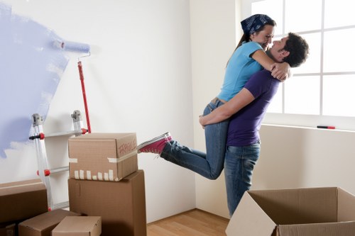 Careful furniture lifting for a flat move in Bow