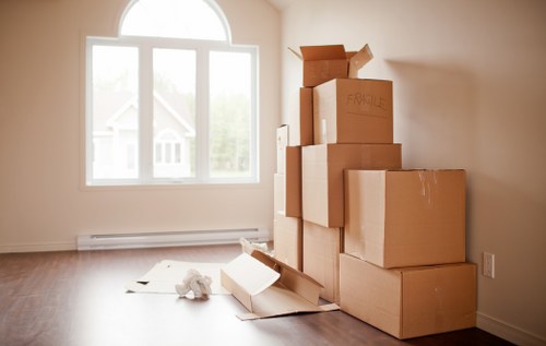 Staff member checking service records related to a removals complaint