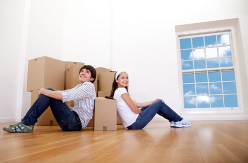 Removal team handling furniture during a student relocation in Bow
