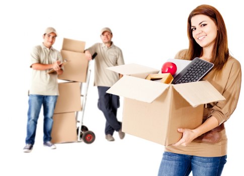 Professional movers handling apartment access and stairways in Bow