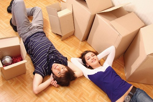 Packing supplies and wrapped furniture ready for Bow removals