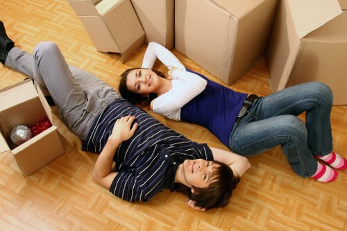Mover handling fragile belongings with care during transport