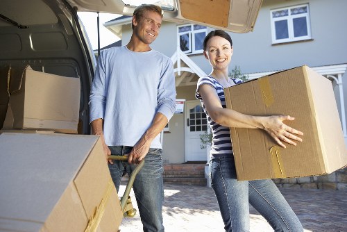Safe moving team handling furniture during Bow removals