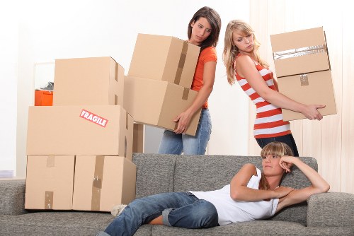 Packing boxes for a student move in Bow
