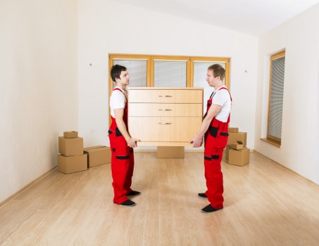 Packed boxes and furniture stored safely in Bow