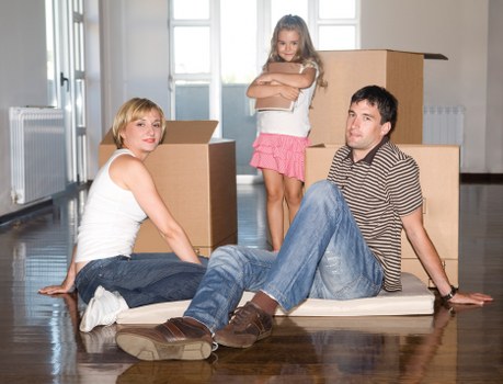 Careful packing of household items for a Bow relocation
